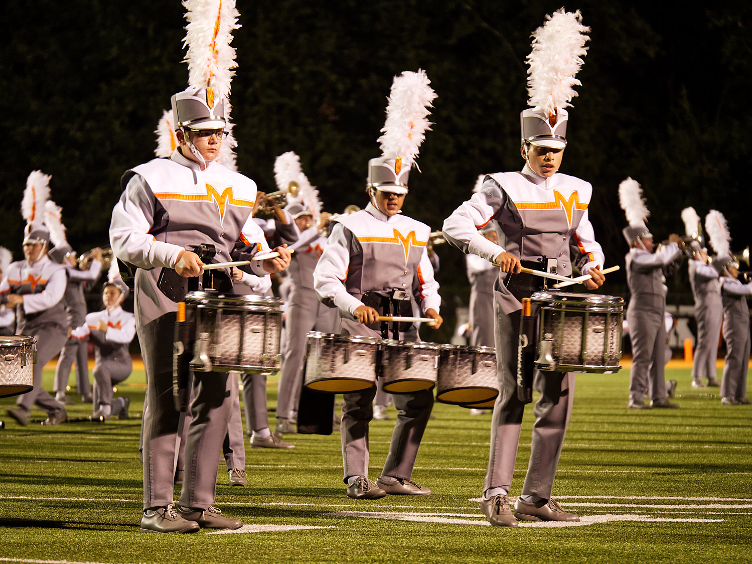 Mineola Sound of the Swarm members during a recent halftime performance.